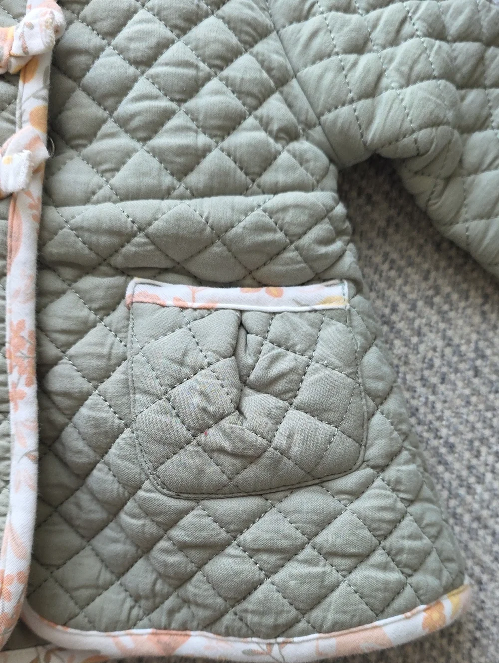 Quilted Sage Green Baby Jacket with Floral Trim